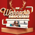 Schriftzug "Weihnachtsdruckerei" mit Poster, das aus einem Drucker kommt